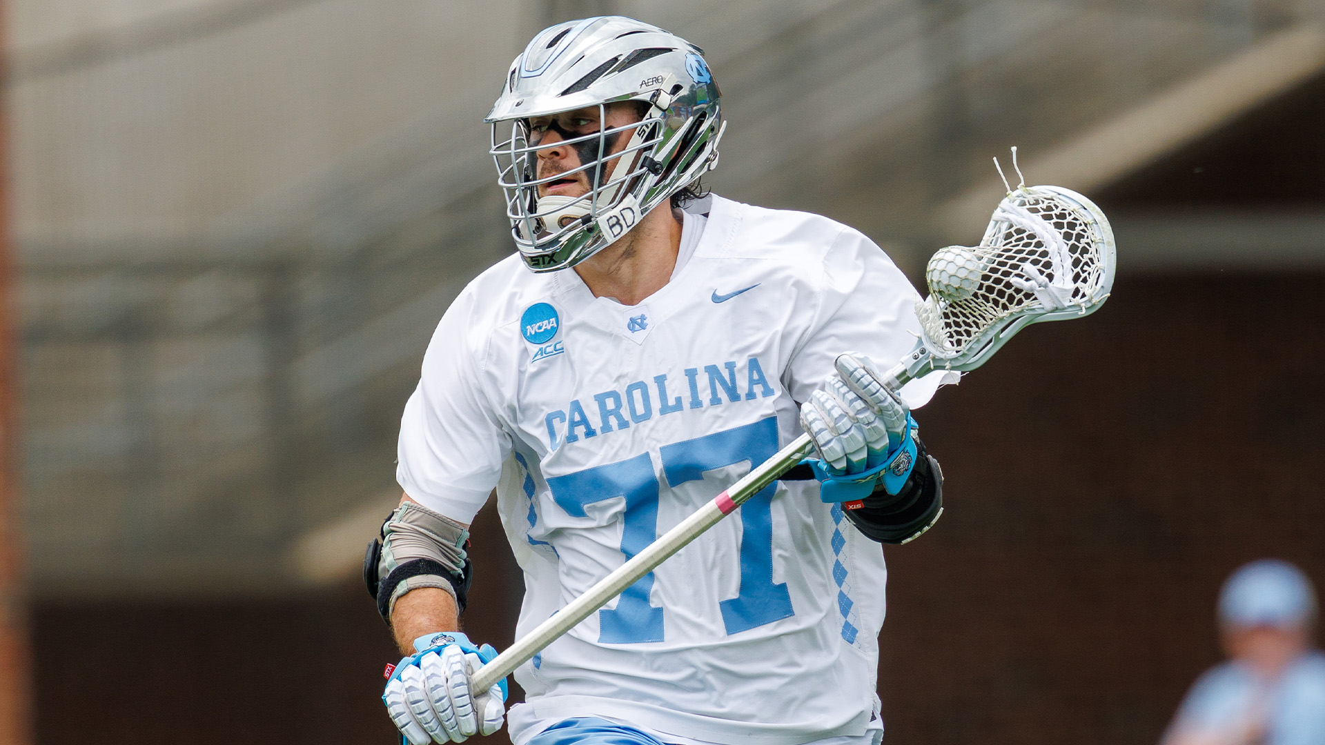 Dom Petromala lacrosse player in action